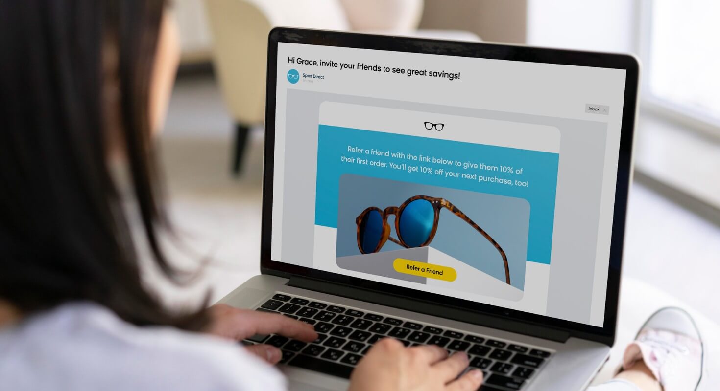 A customer getting a referral program email from a glasses company.