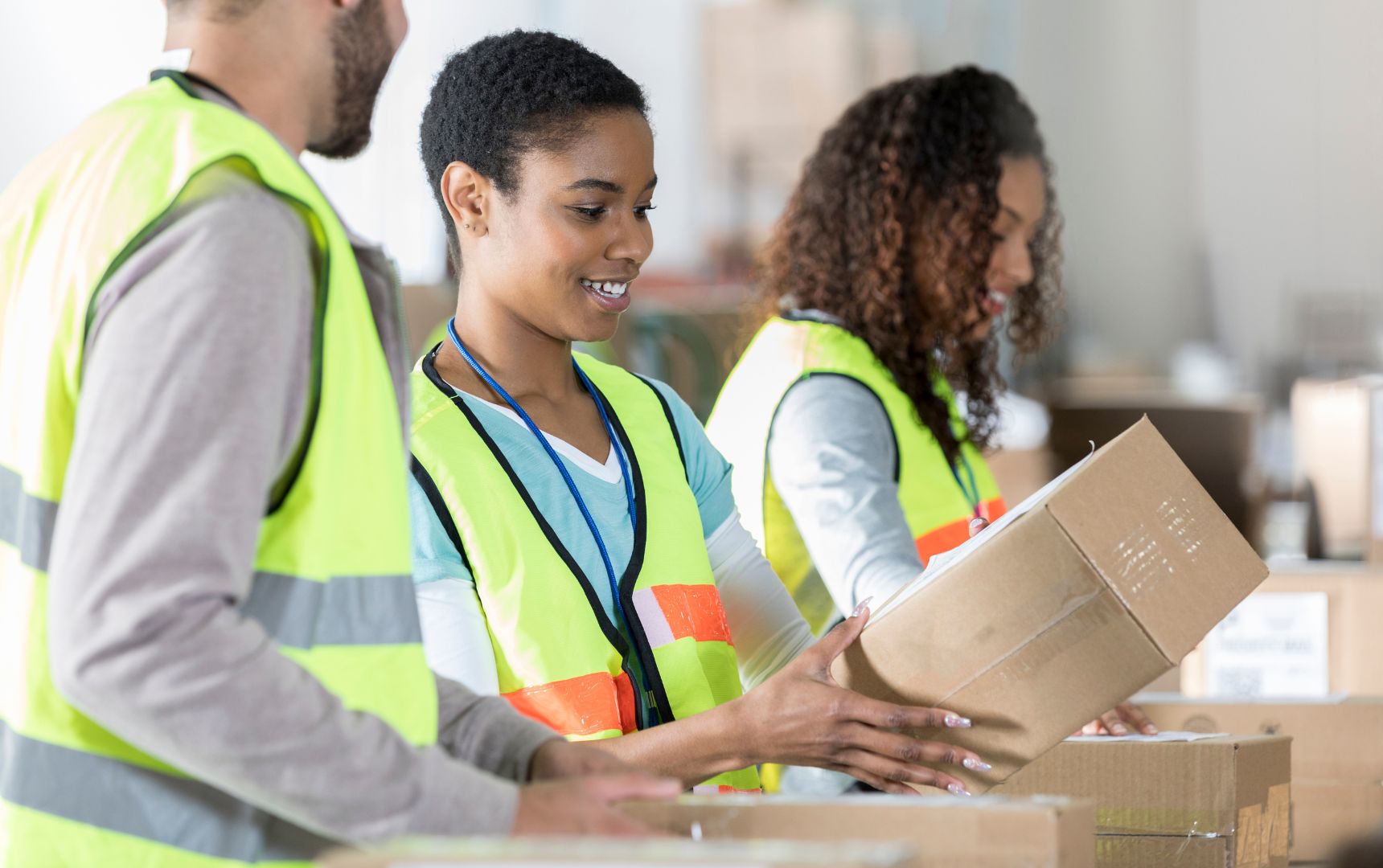 A Group of Distributors Working to Pack Shipments