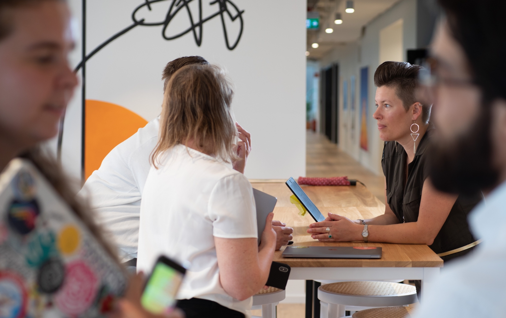 Company Team Members Collaborating in a Meeting