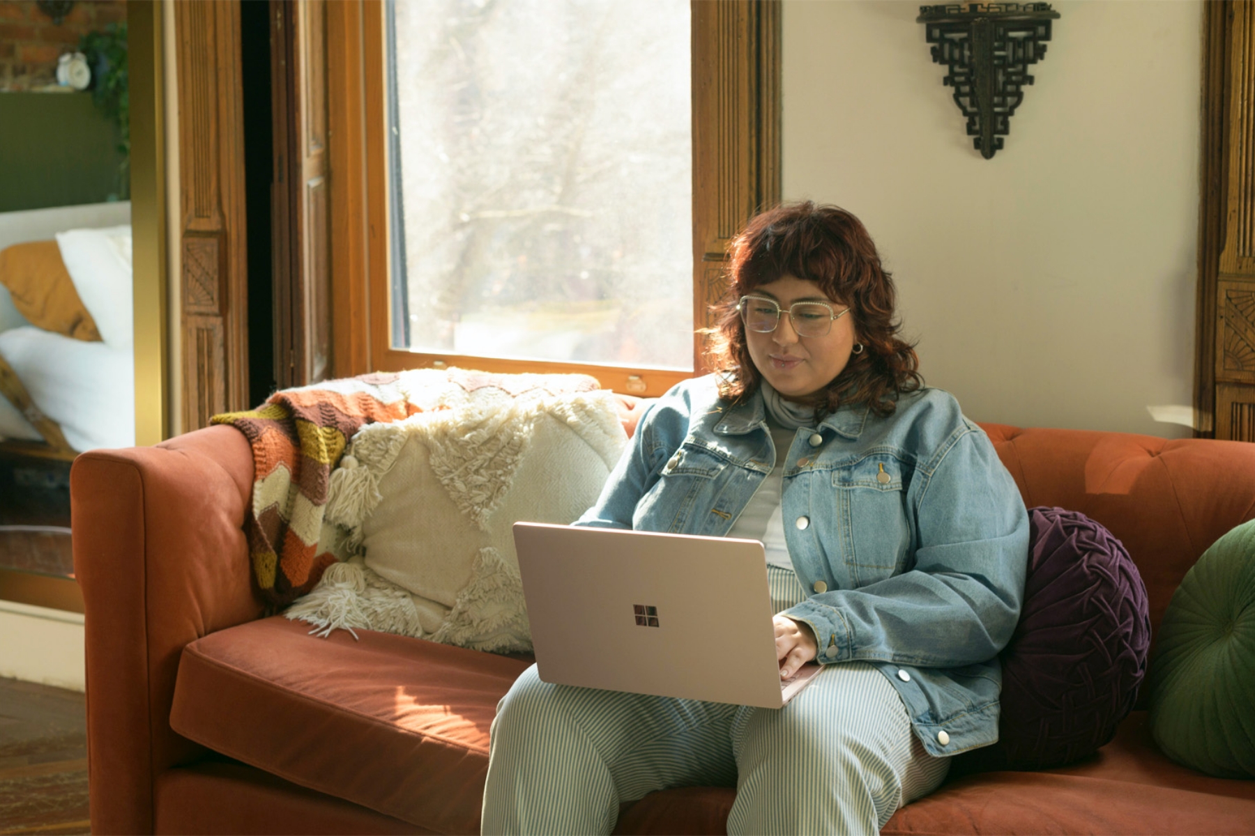 Gen-Z Woman Using Her Laptop to Shop Online