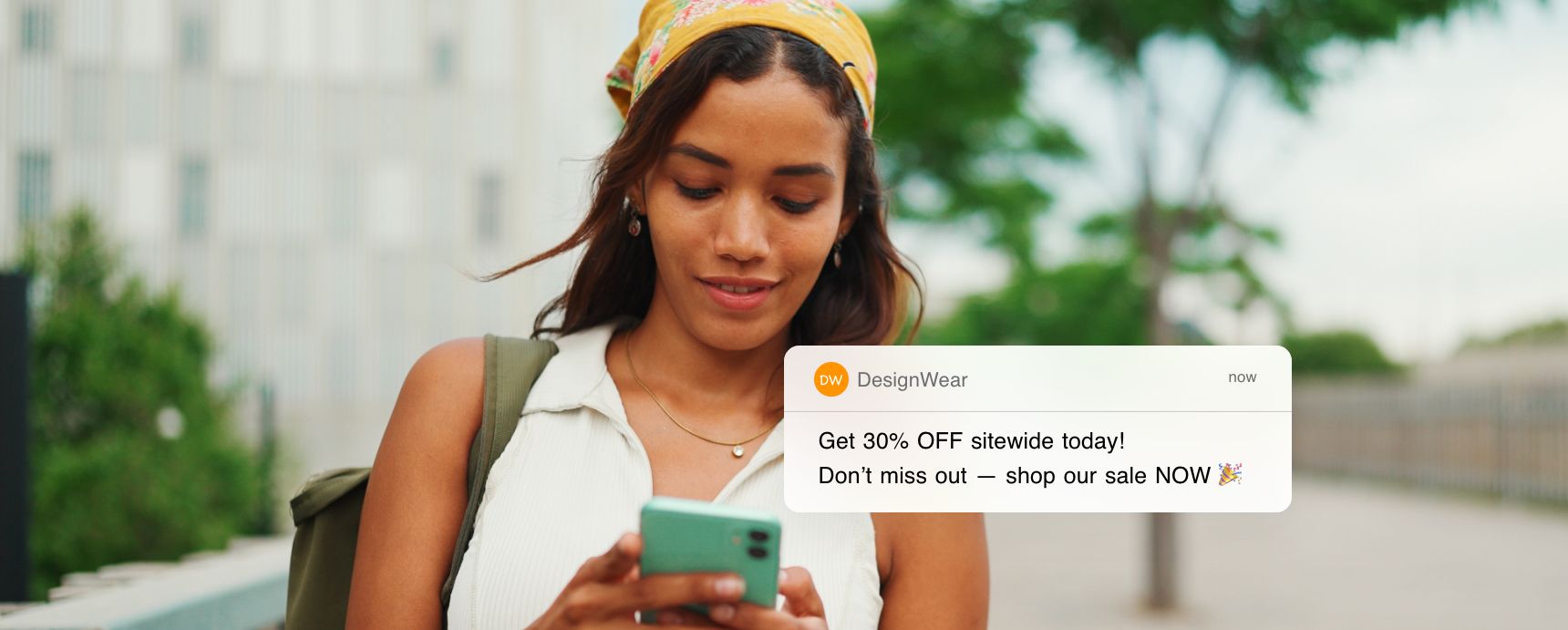 A mobile phone user getting a push notification about a 24-hour sale