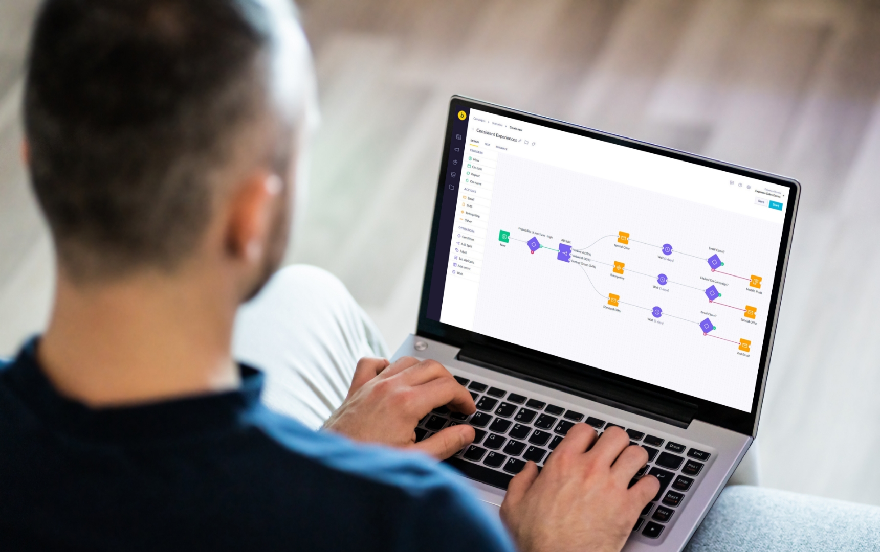 Person using Bloomreach Engagement to set up an email flow