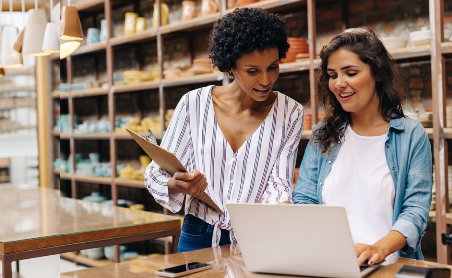 Two people looking at inventory for predictive analytics